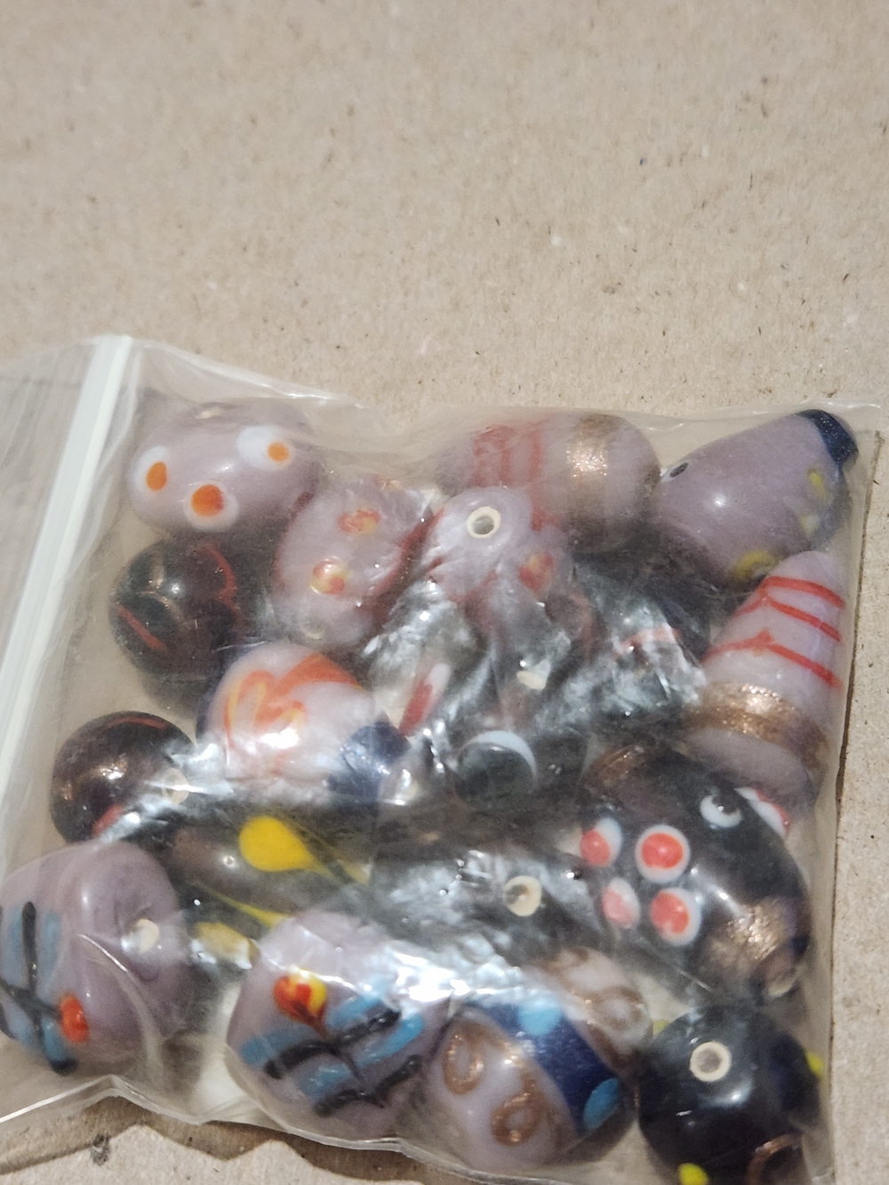 18 Handmade Glass Bead Mix - Purple (light & dark), Black, Gold, & Blue Accents